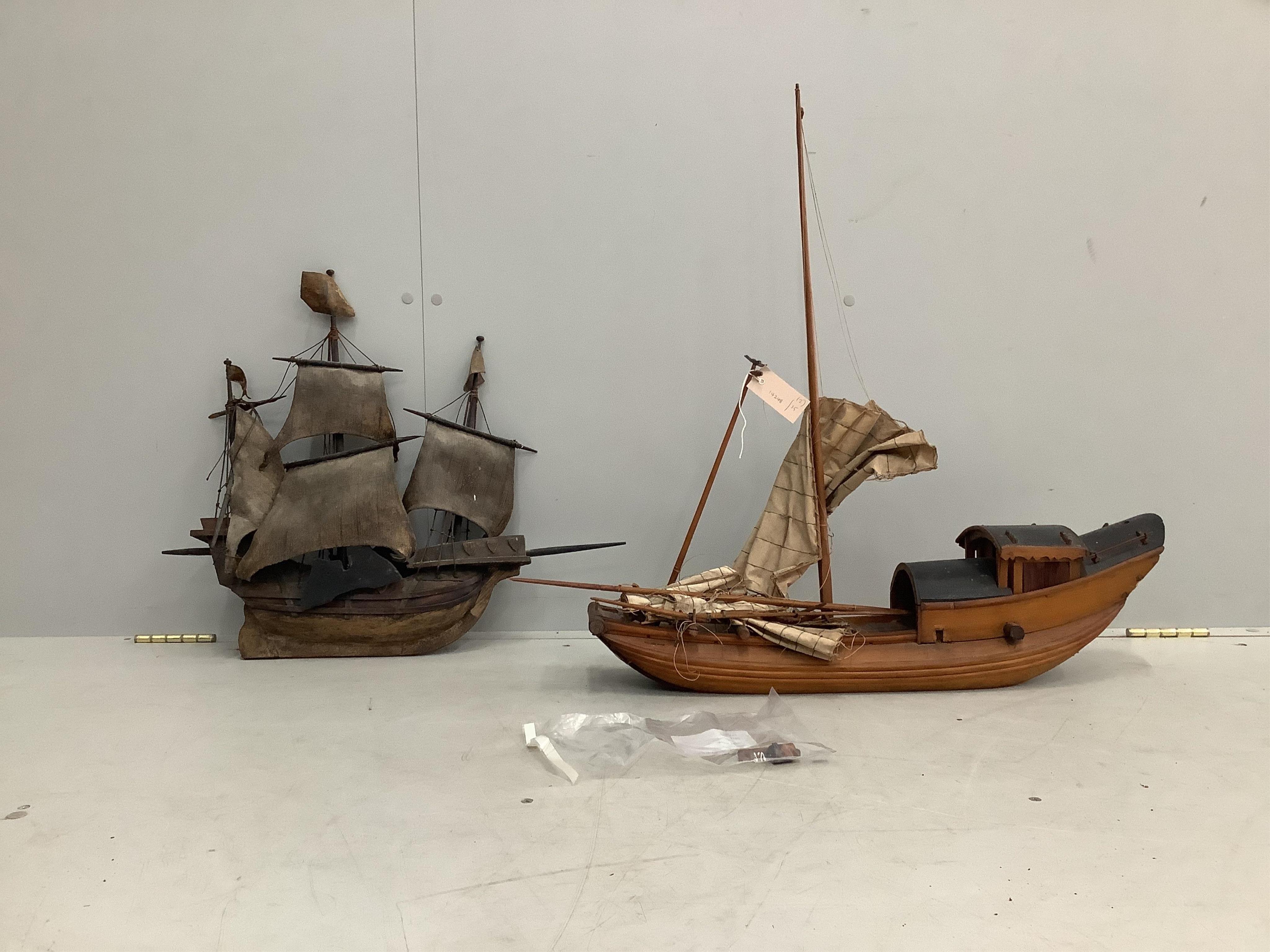 Two wooden model boats, larger length 67cm. Condition - poor
